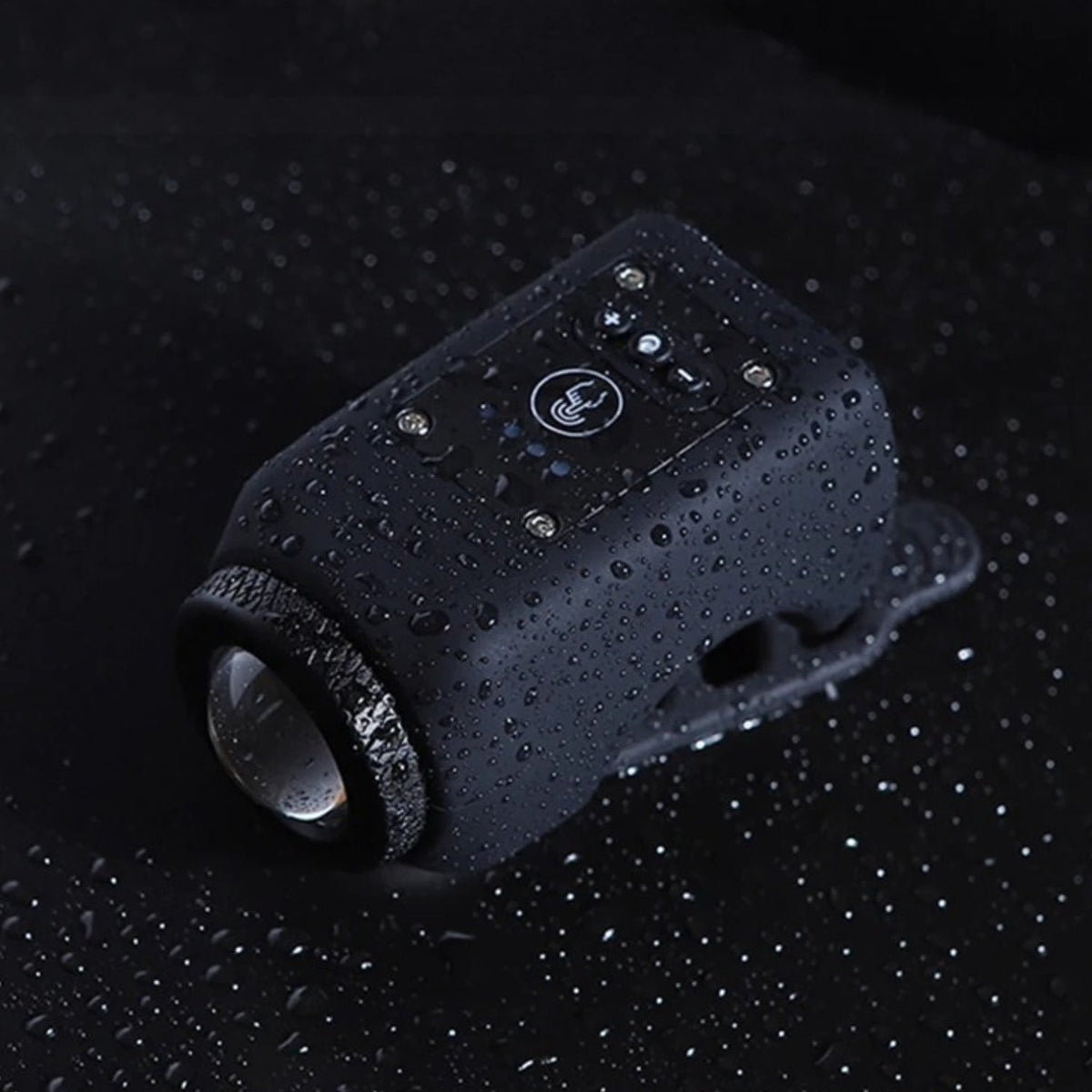 Clacson elettrico e faro 2-in-1 in nero con schizzi d'acqua