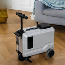 Valigia elettrica cavalcabile PowerDrive Pro Edition in argento a casa