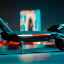 Monopattino elettrico NAVEE ST3 Pro visto di lato in un ambiente serale