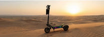 Monopattino elettrico OOTD T10 Pro visto di lato al tramonto