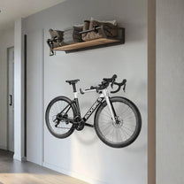 Supporto a muro smart per bici con una bici al muro in un corridoio