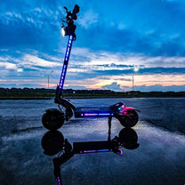 Monopattino elettrico TEVERUN FIGHTER ELEVEN+ V4 visto di tre quarti al tramonto