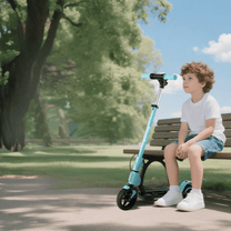 Persona seduta accanto al monopattino elettrico per bambini Wheely Junior S2 Pro