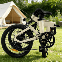 Bici elettrica pieghevole YANGOR H19 piegata in colore beige su un prato